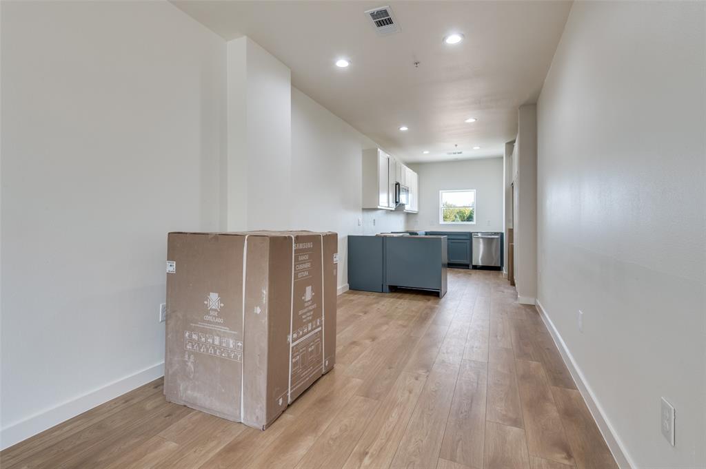 516 South O Connor Road Irving, TX 75060 - Photo 25 of 40 a view of kitchen with wooden floor
