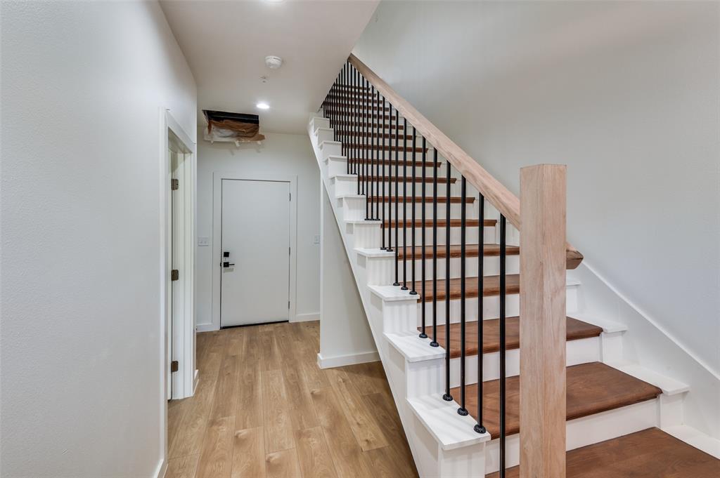 516 South O Connor Road Irving, TX 75060 - Photo 7 of 40 a view of entryway with wooden floor