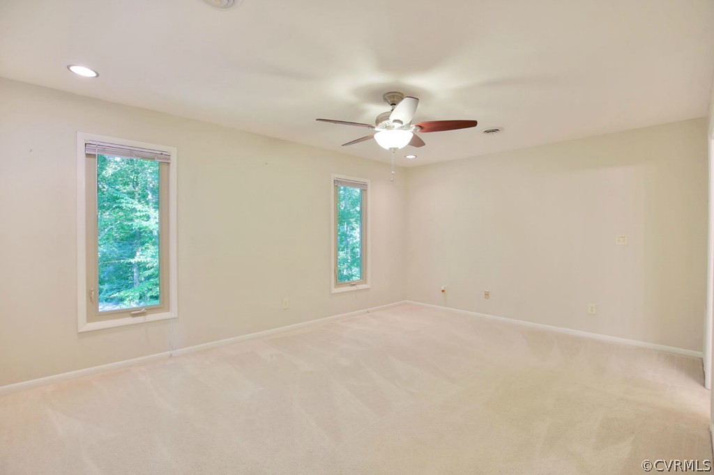 3509 Stoney Ridge Road Midlothian, VA 23112 - Photo 20 of 24 an empty room with windows and fan