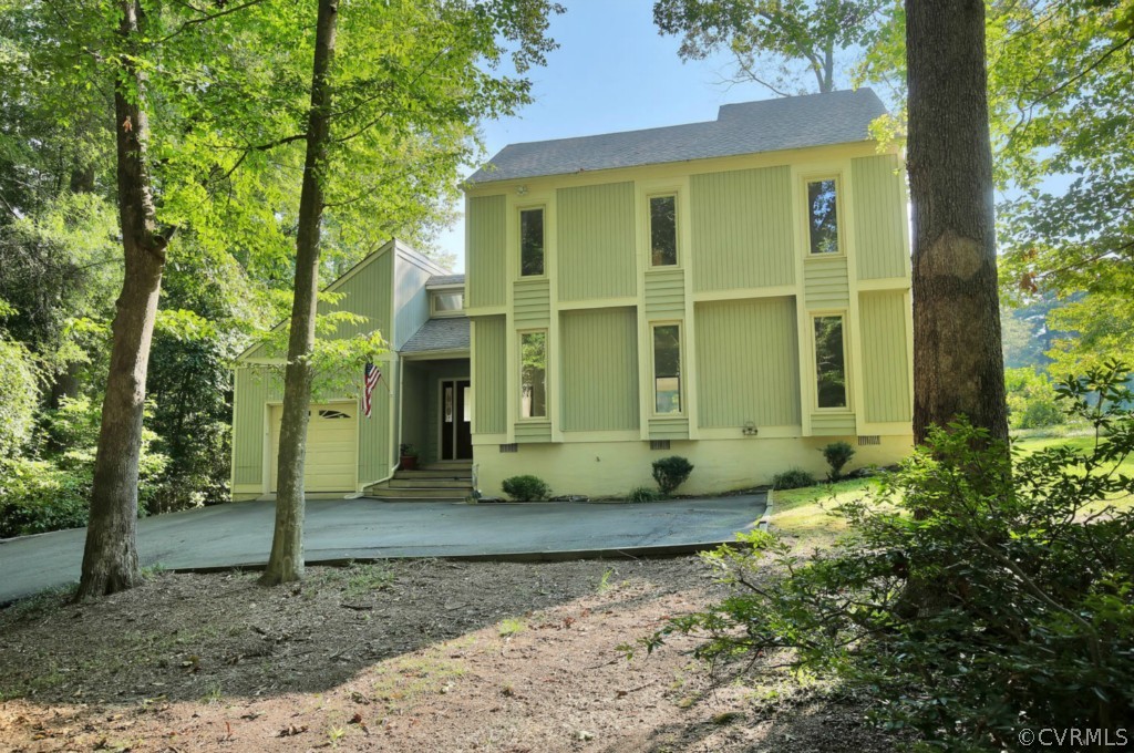 3509 Stoney Ridge Road Midlothian, VA 23112 - Photo 24 of 24 a front view of a house with garden