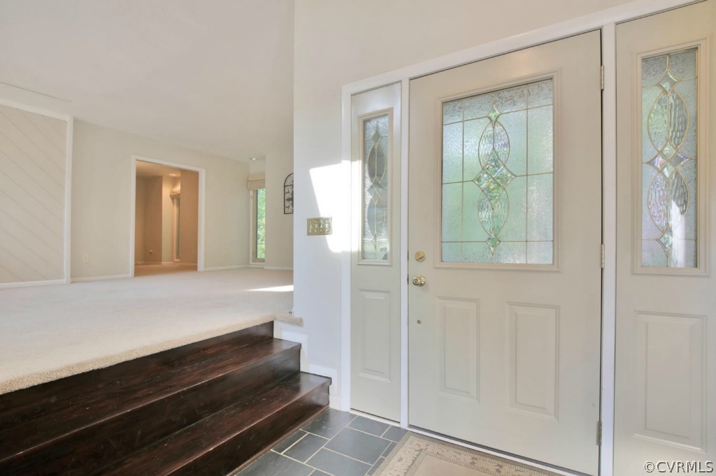 3509 Stoney Ridge Road Midlothian, VA 23112 - Photo 4 of 24 a hallway with vanity and a mirror