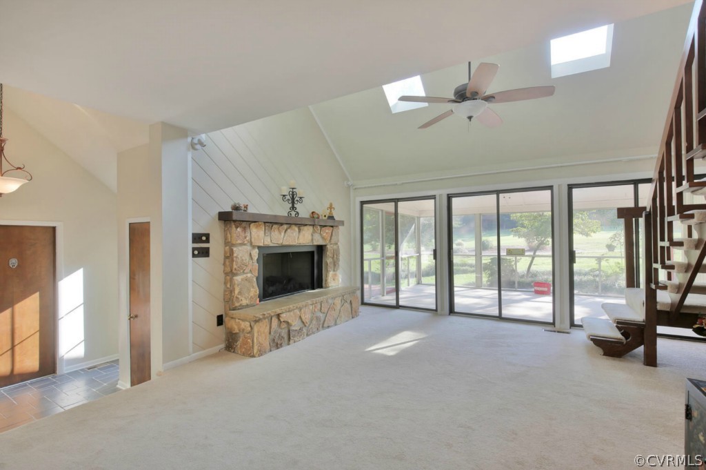 3509 Stoney Ridge Road Midlothian, VA 23112 - Photo 6 of 24 a view of an empty room with a fireplace and a large window