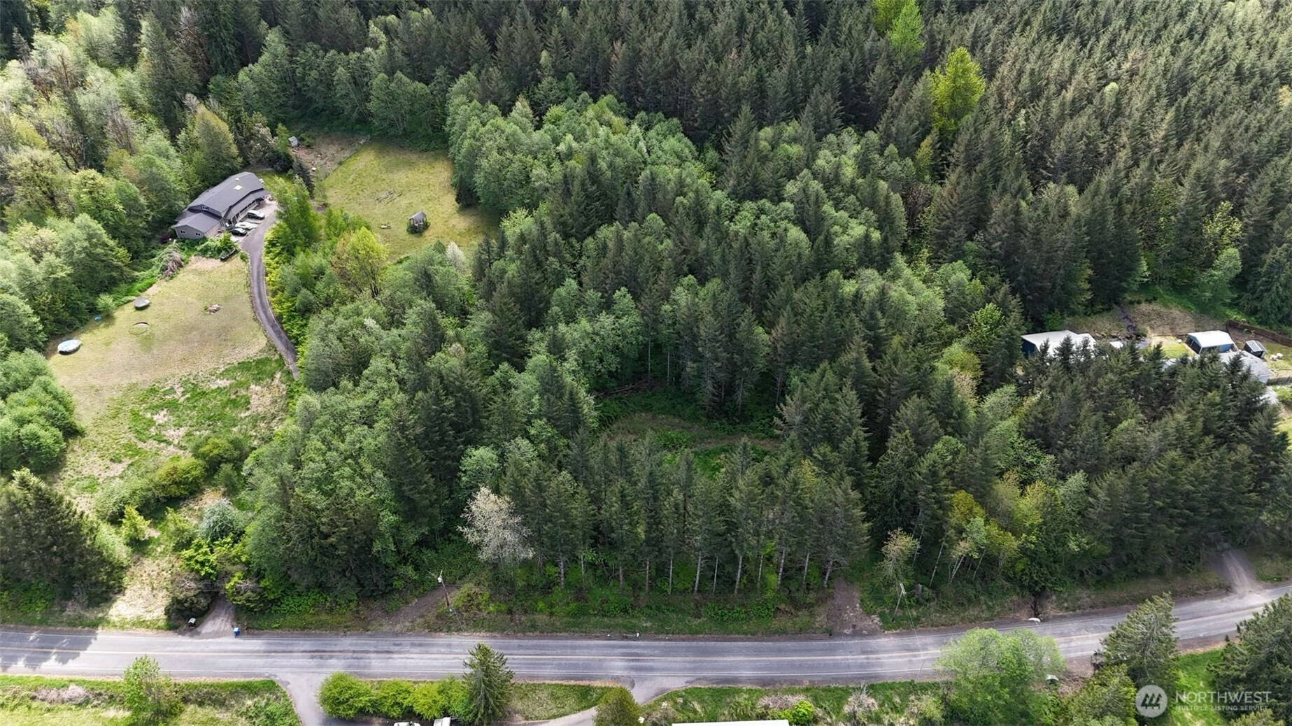 426 Highland Valley Road Morton, WA 98356 - Photo 10 of 14 an aerial view of a house with yard