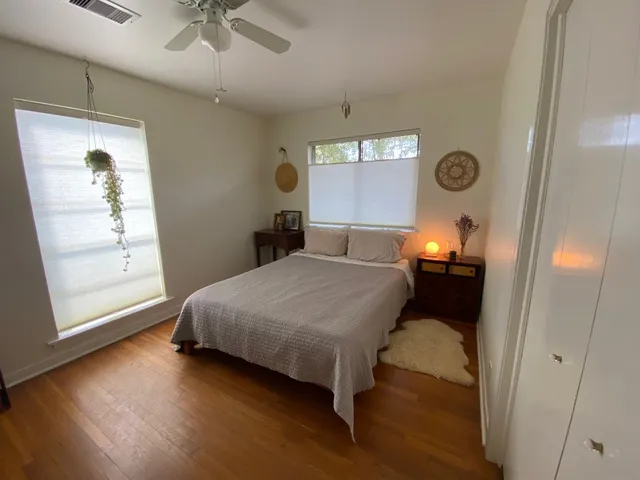 a bathroom with a sink toilet and mirror