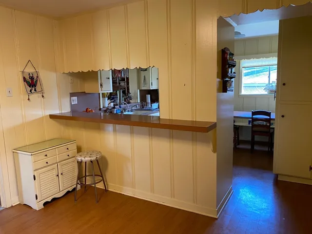 a view of a dining room with furniture