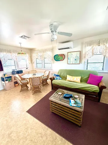 a kitchen with a refrigerator and a sink