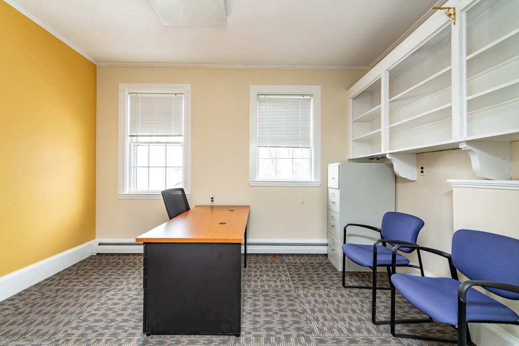 5 Phillips Place Cambridge, MA 02138 - Photo 8 of 8 a room with furniture and a window