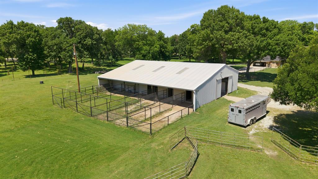 145 Indian Trail Decatur, TX 76234 - Photo 25 of 40 an aerial view of a house having yard patio and tree s