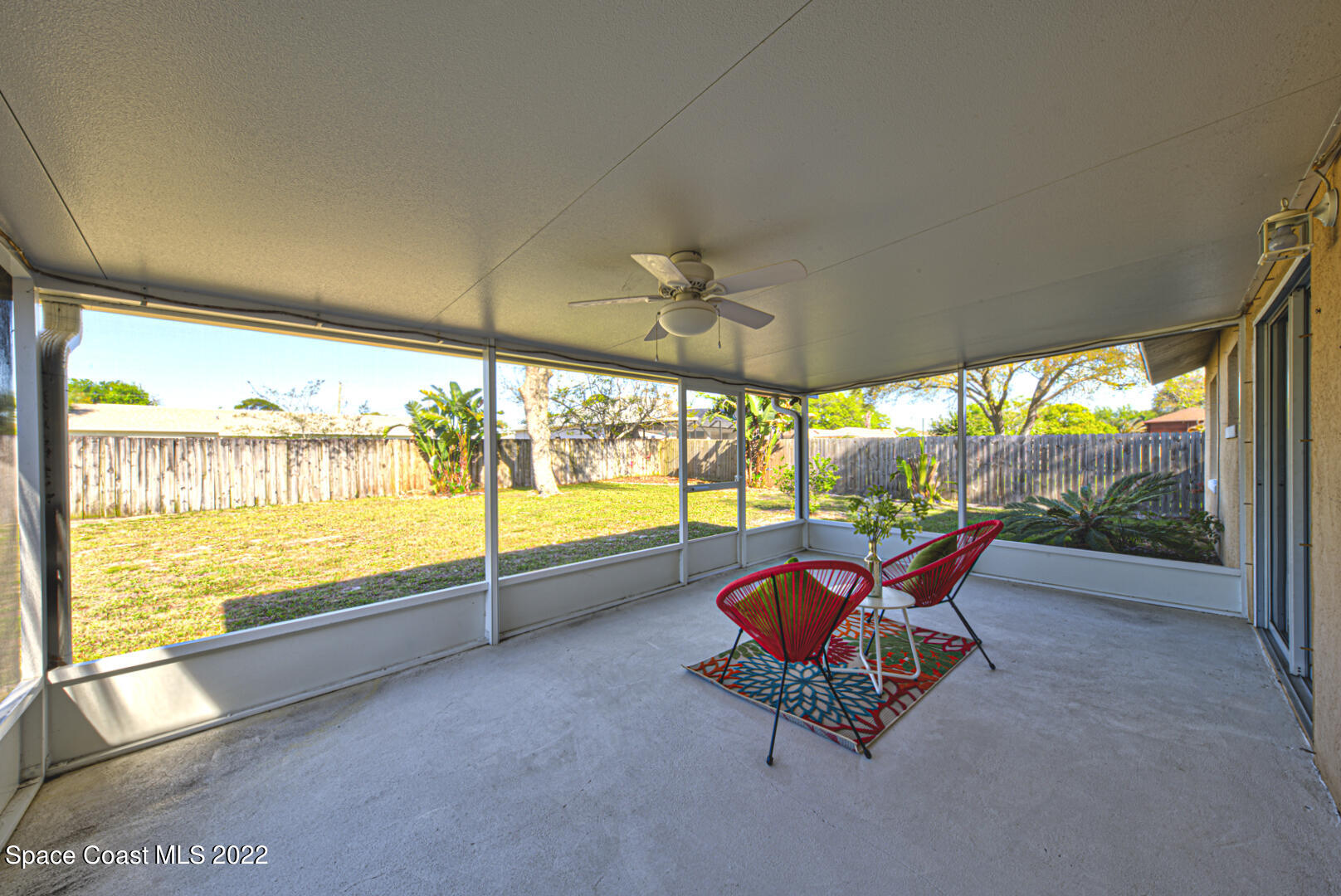 6820 Cairo Road Cocoa, FL 32927 - Photo 24 of 28 screened-in back porch