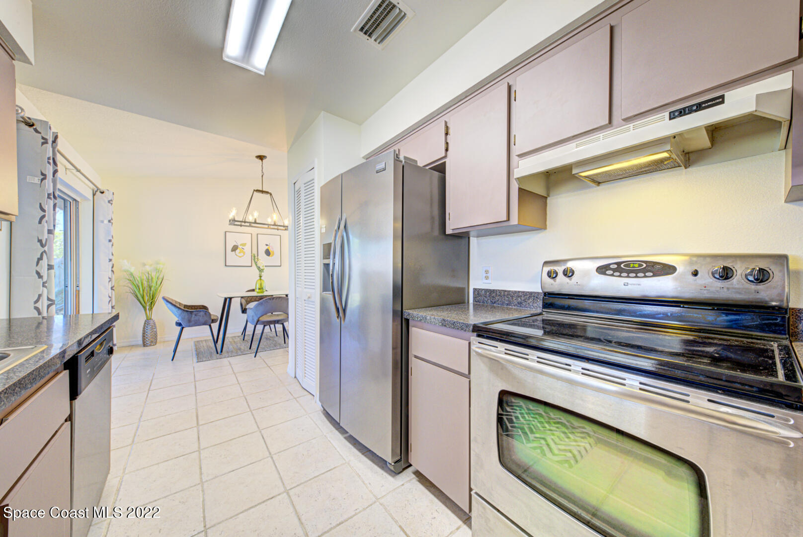 6820 Cairo Road Cocoa, FL 32927 - Photo 9 of 28 kitchen open to dining room