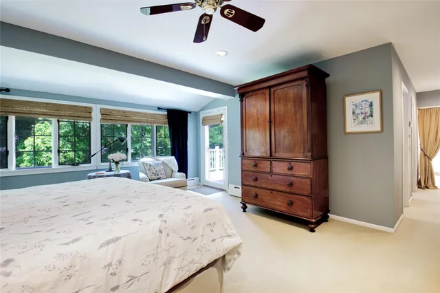 a bed room with a bed and furniture