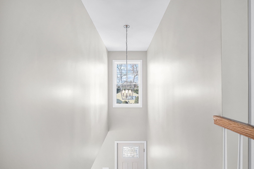 39 Wallace Street Springfield, MA 01119 - Photo 36 of 41 a picture of a hallway with window