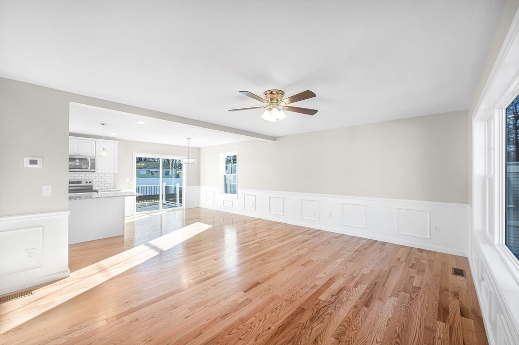39 Wallace Street Springfield, MA 01119 - Photo 5 of 41 wooden floor in an empty room with a window