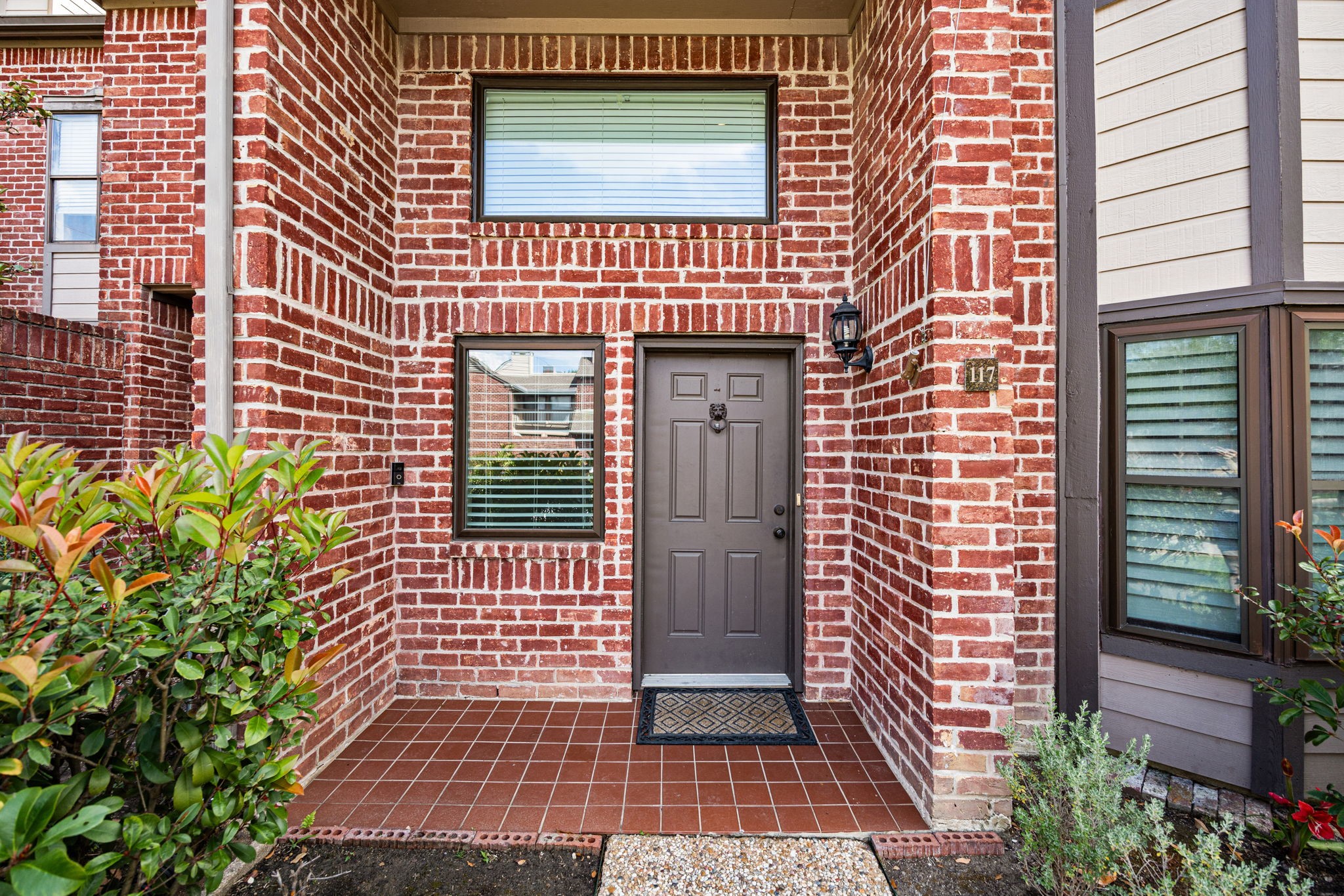 7447 Cambridge Street, Unit 117 Houston, TX 77054 - Photo 1 of 38 a view of a house with a door