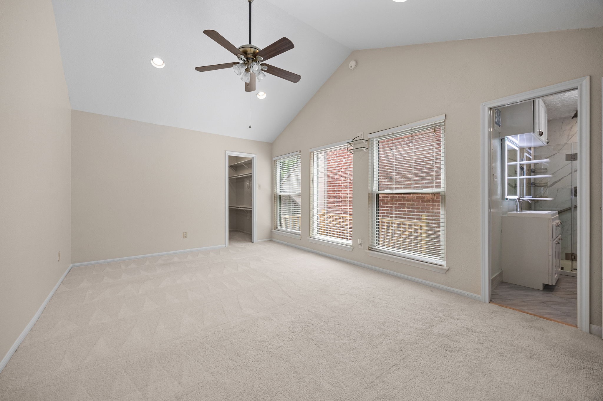 7447 Cambridge Street, Unit 117 Houston, TX 77054 - Photo 14 of 38 a view of an empty room with a window