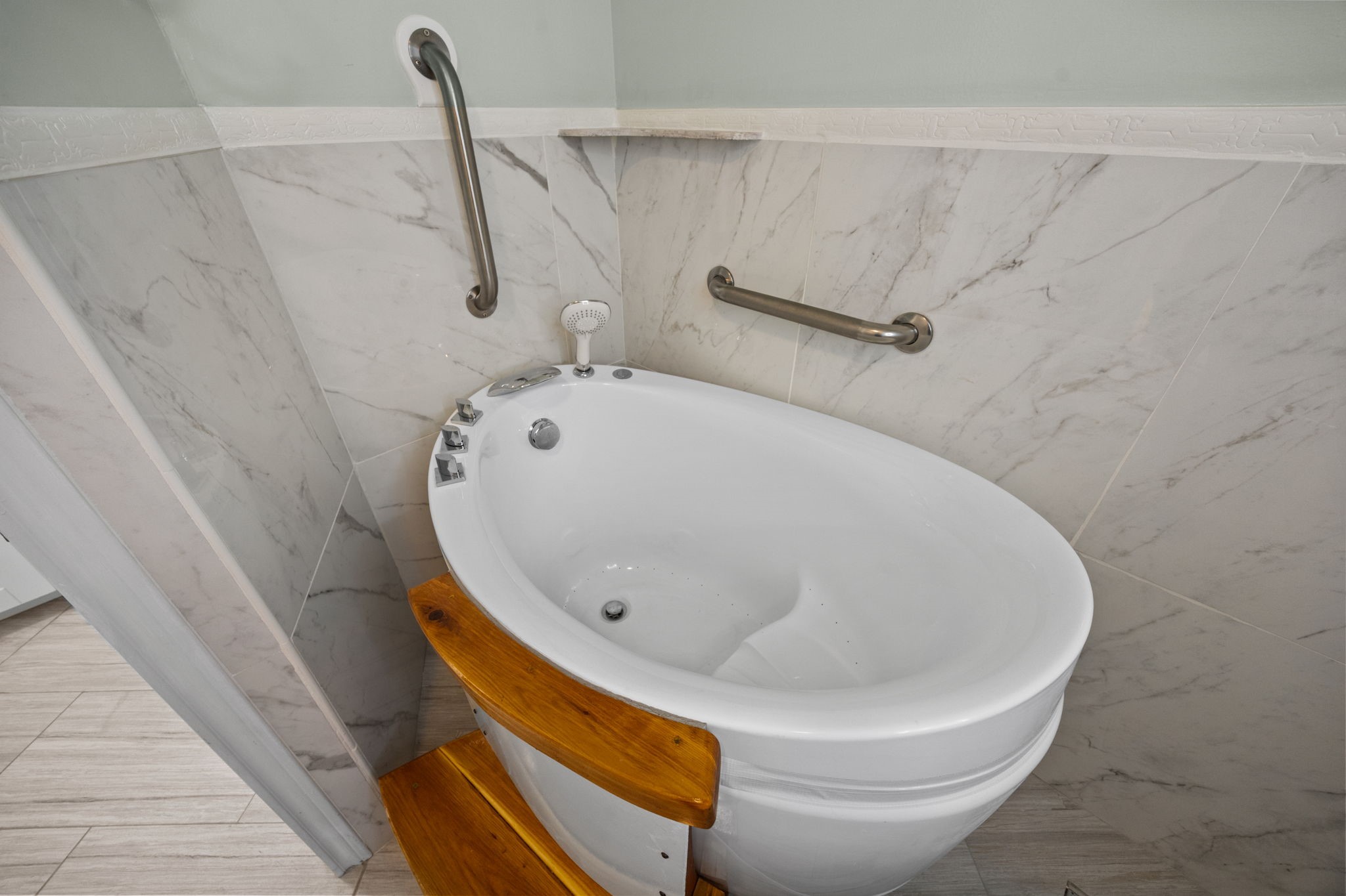 7447 Cambridge Street, Unit 117 Houston, TX 77054 - Photo 17 of 38 a bathroom with a sink and a toilet
