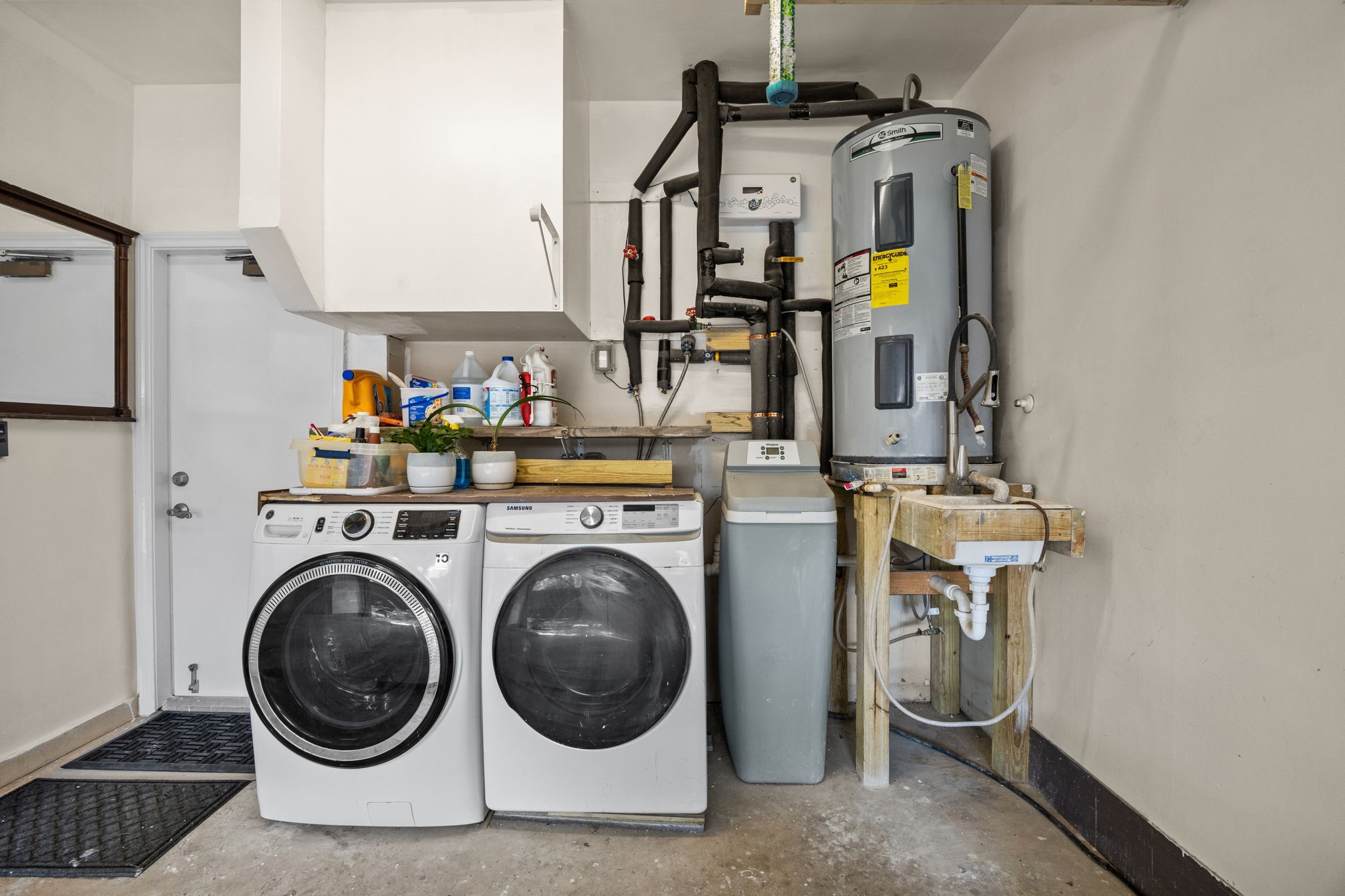 7447 Cambridge Street, Unit 117 Houston, TX 77054 - Photo 25 of 38 a utility room with dryer and washer