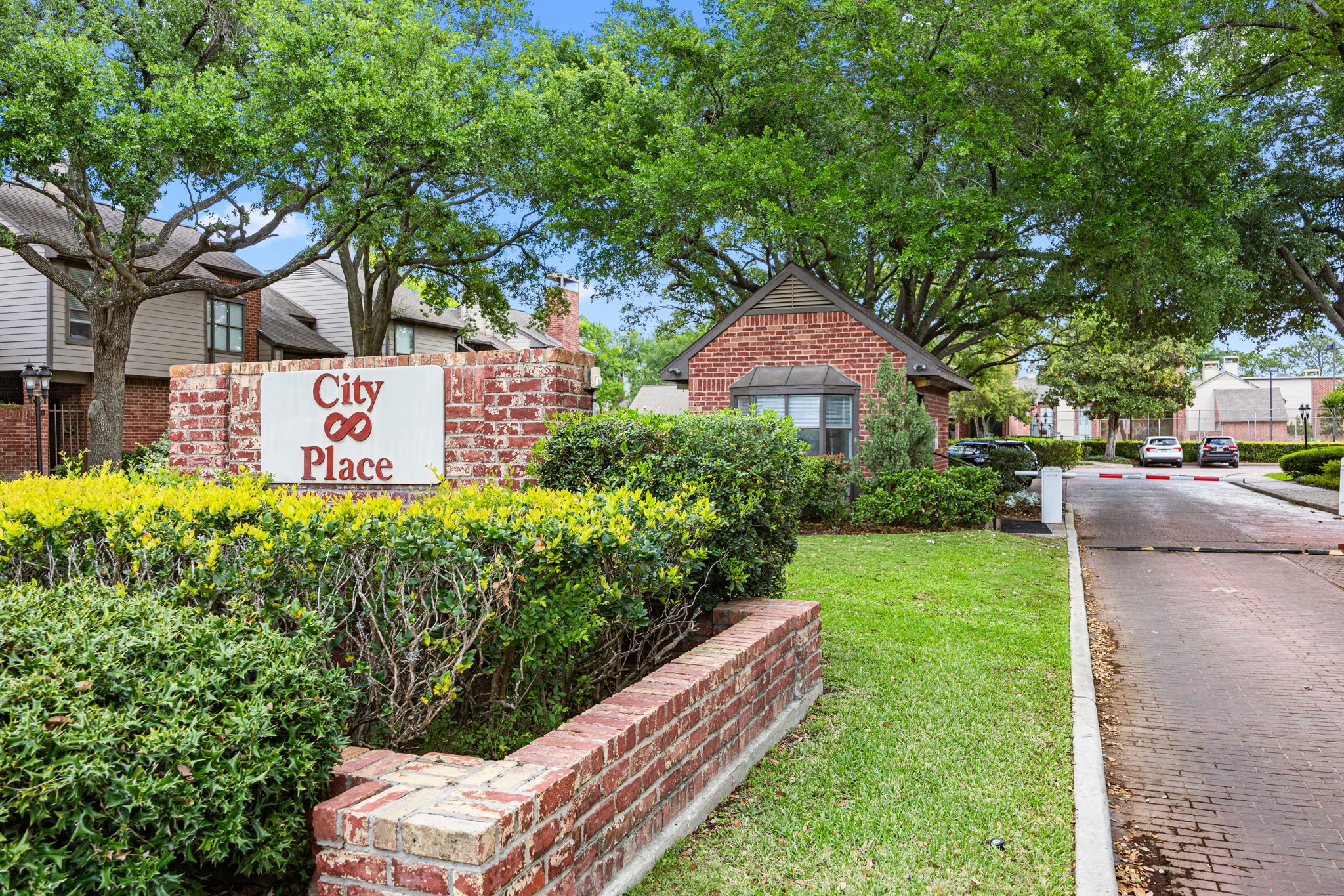 7447 Cambridge Street, Unit 117 Houston, TX 77054 - Photo 27 of 38 a sign board with buildings in the background