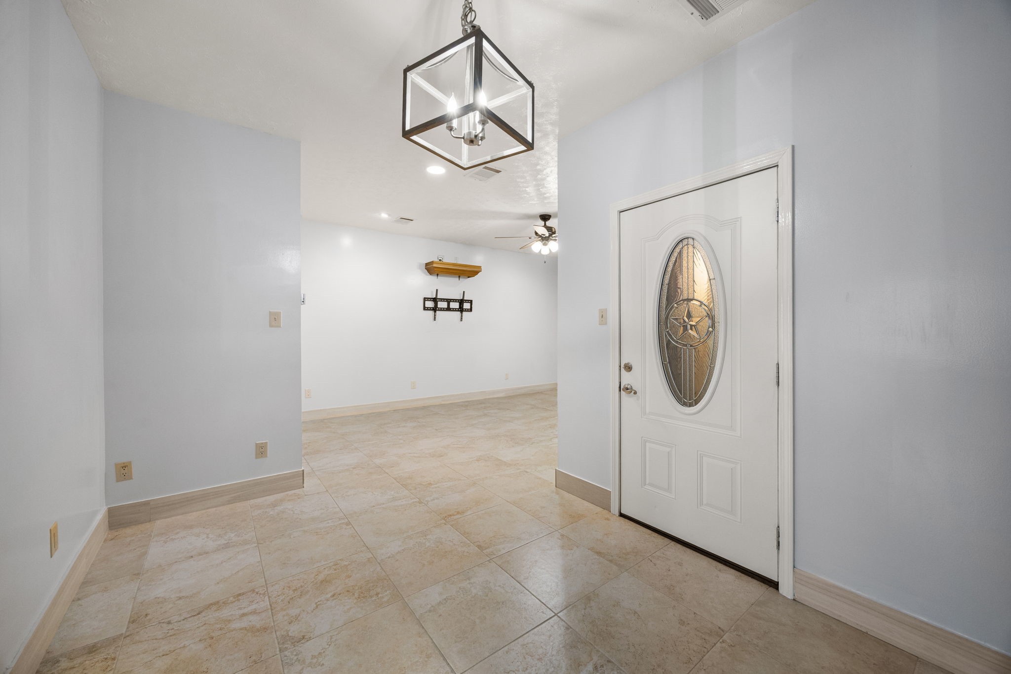 7447 Cambridge Street, Unit 117 Houston, TX 77054 - Photo 9 of 38 a view of a hallway with washer and dryer