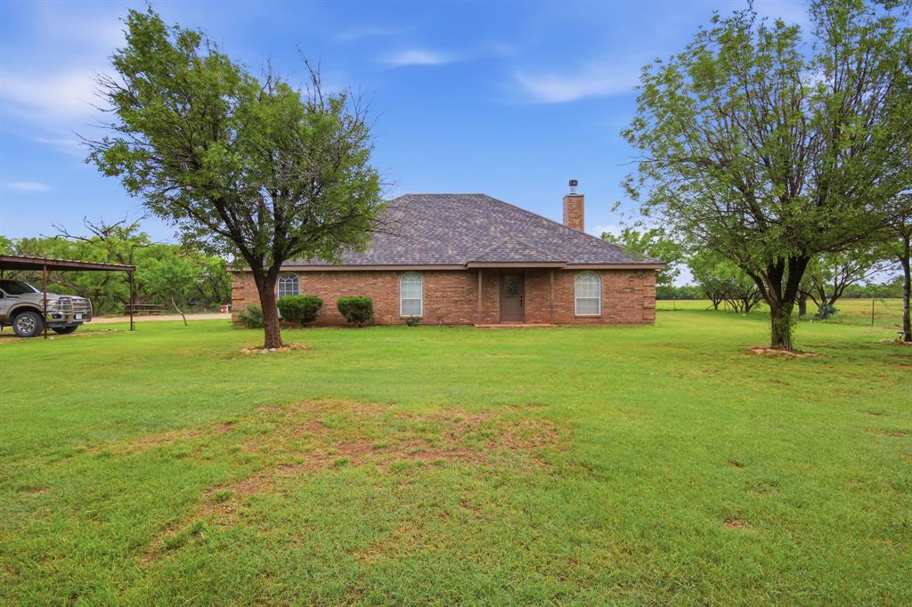 691 County Road 349 Merkel, TX 79536 - Photo 1 of 31 a front view of a house with a yard