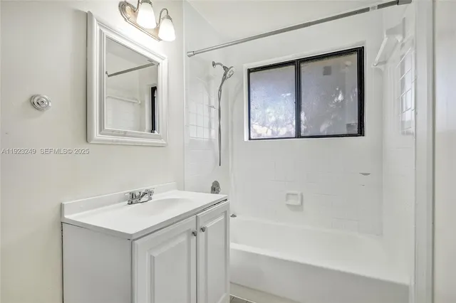 a bathroom with a mirror