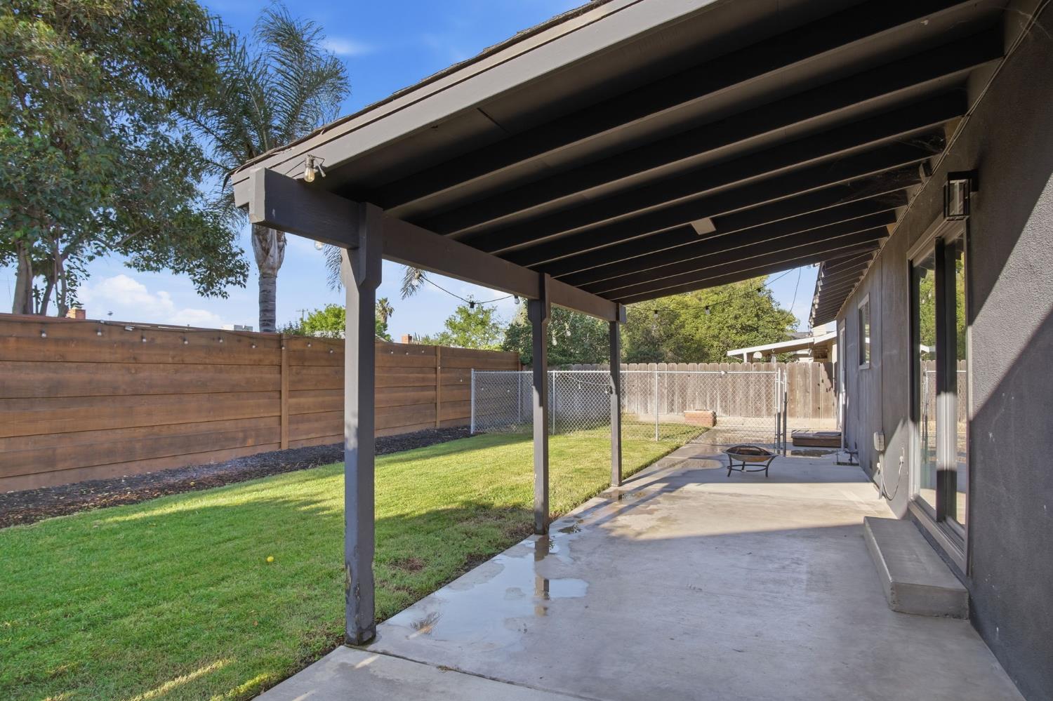 680 Sherri Way Turlock, CA 95382 - Photo 22 of 35 a view of a backyard with a garden