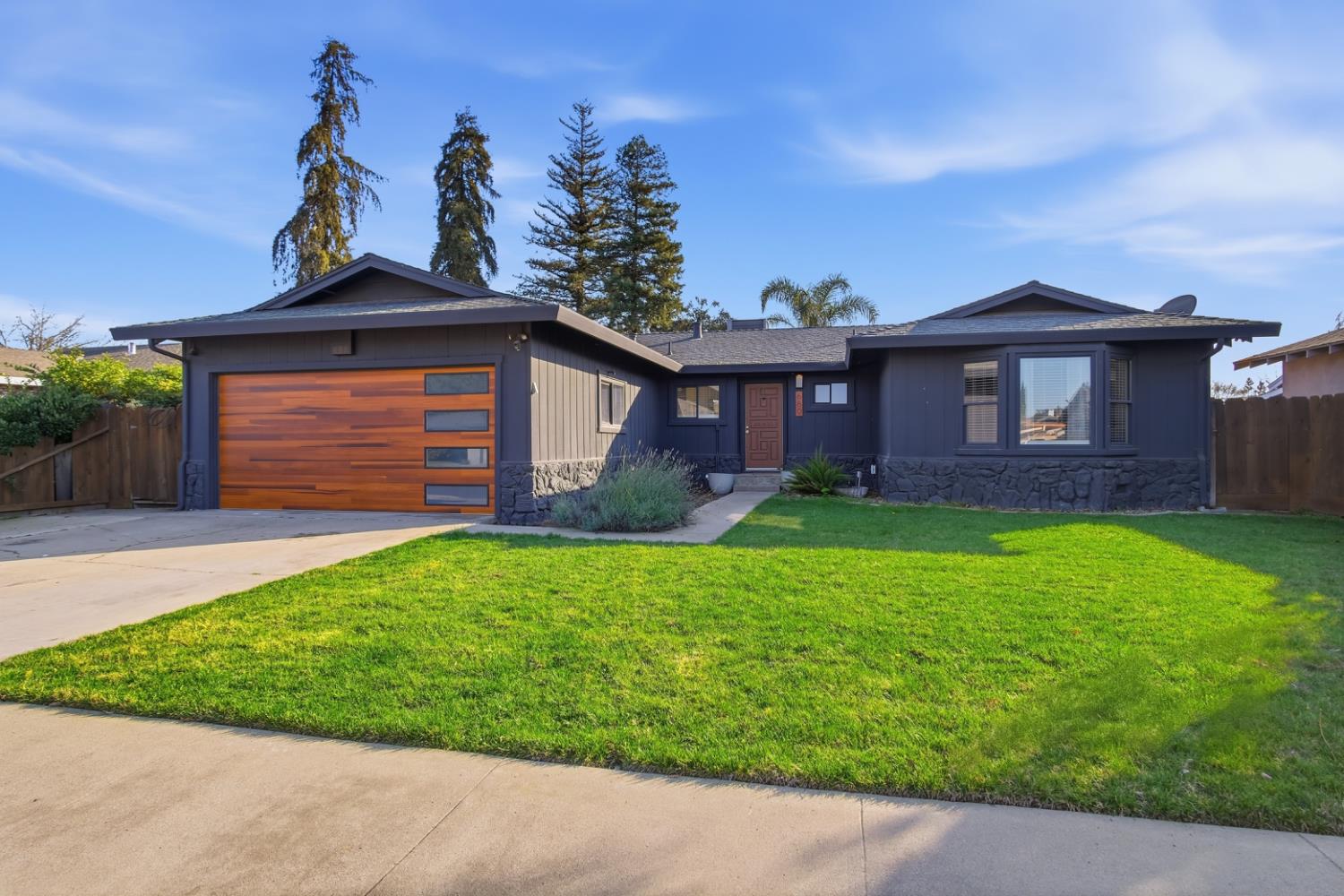 680 Sherri Way Turlock, CA 95382 - Photo 33 of 35 a view of a house with a yard