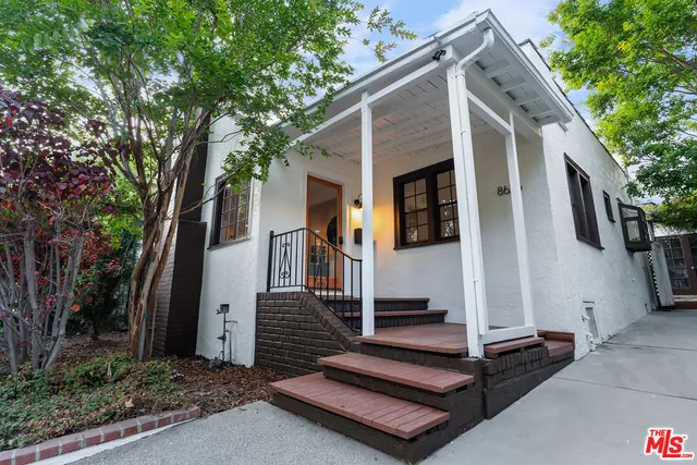 a view of a house with a small cabin