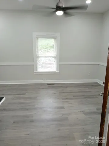 a view of a room that has a window