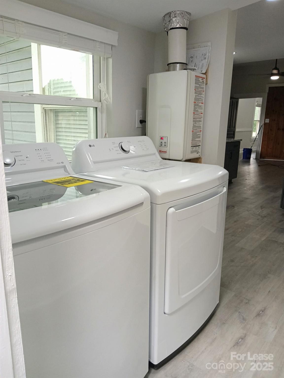 238 South Main Street, Unit A Davidson, NC 28036 - Photo 10 of 11 a utility room with dryer and washer