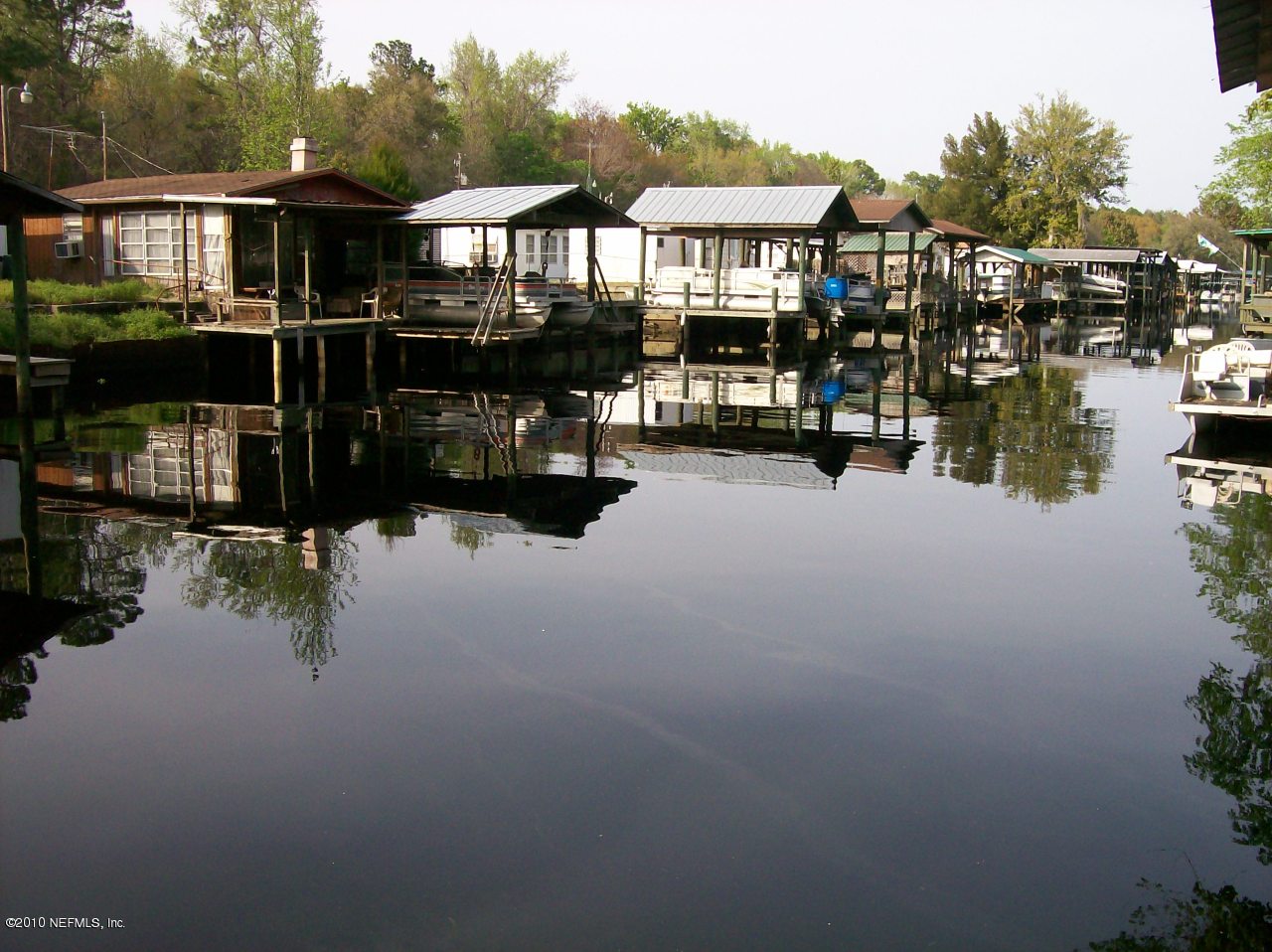 157 Smith Satsuma, FL 32189 - Photo 7 of 7 a view of a lake and residential houses