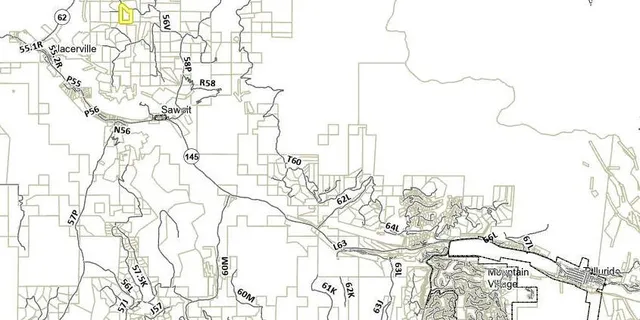 a picture of a tree with a white house