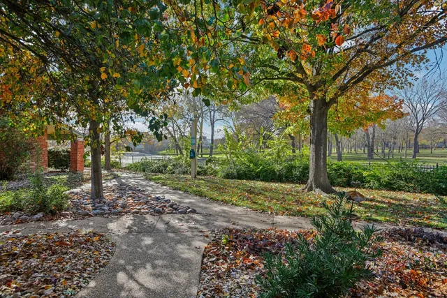 a backyard of a house with lots of green space