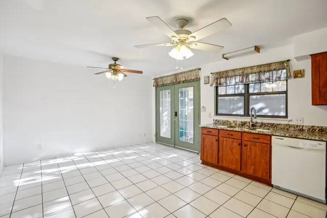 a bathroom with a sink a mirror and a toilet
