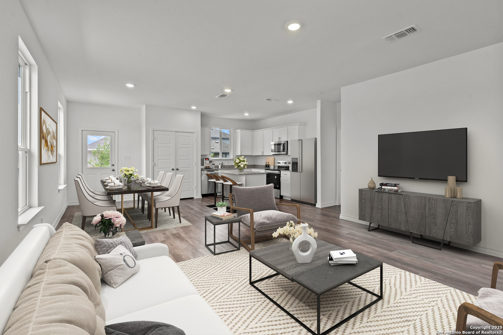 409 Raven Row Marion, TX 78124 - Photo 2 of 6 a living room with furniture and a flat screen tv
