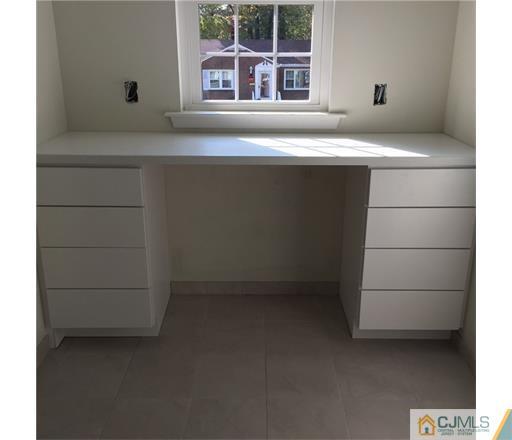 52 West Cliff Road Colonia, NJ 07067 - Photo 14 of 18 a room with a window and a sink