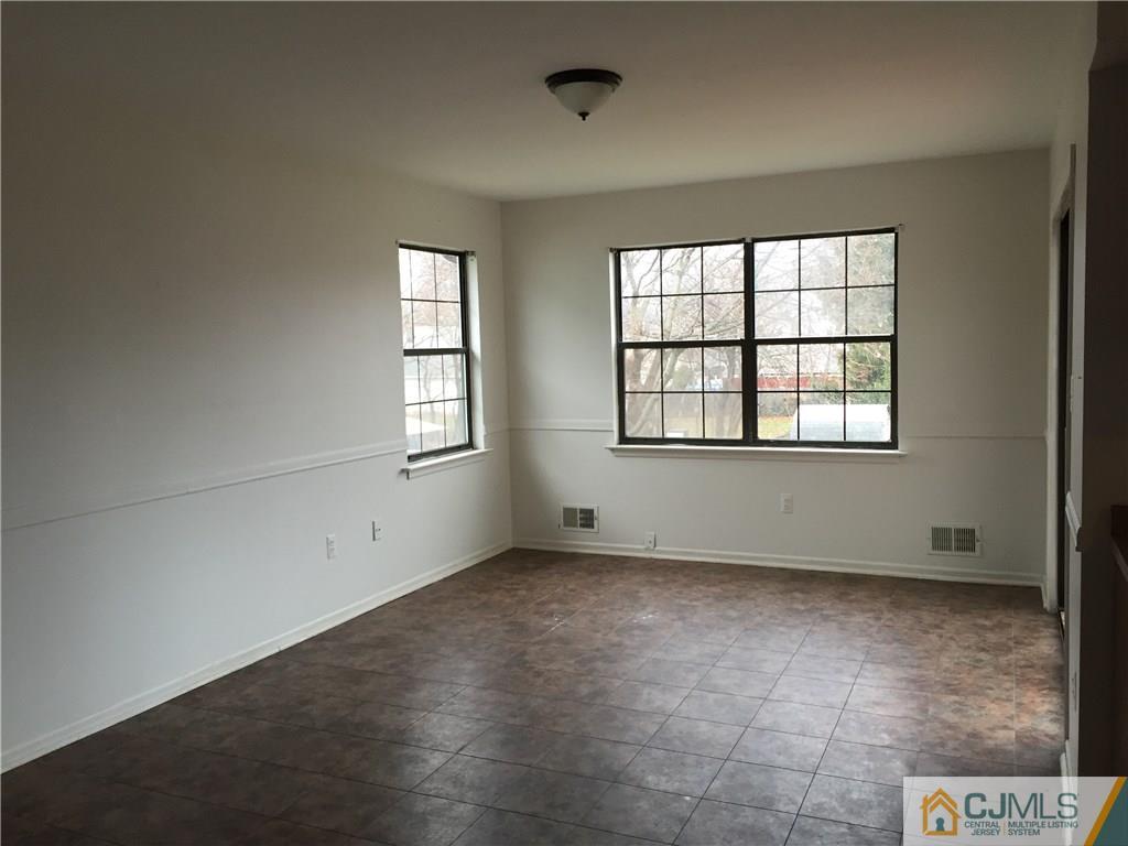 52 West Cliff Road Colonia, NJ 07067 - Photo 17 of 18 a view of an empty room with a window