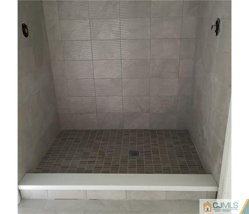 52 West Cliff Road Colonia, NJ 07067 - Photo 10 of 18 a bathroom with a bathtub