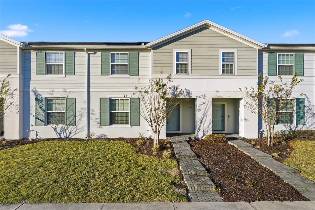 236 Jetty Way Davenport, FL 33897 - Photo 1 of 25 a front view of a house with garden