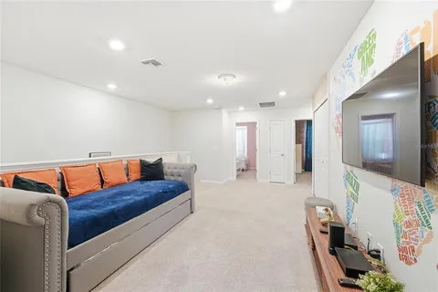 a living room with furniture and a couch