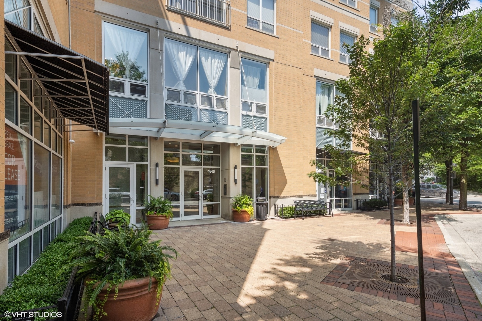 1640 Maple Avenue, Unit 704 Evanston, IL 60201 - Photo 2 of 15 a view of a building with a street