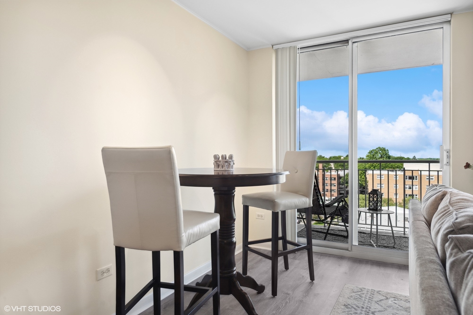 1640 Maple Avenue, Unit 704 Evanston, IL 60201 - Photo 9 of 15 a view of a dining room with furniture window and outside view