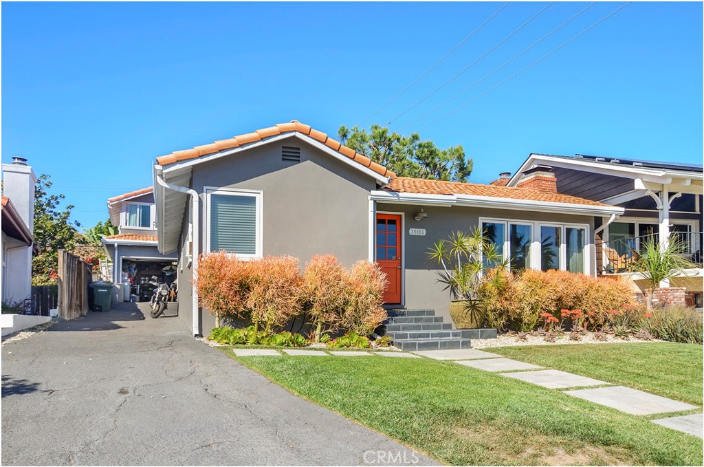 34556 Calle Naranja, Unit A Dana Point, CA 92624 - Photo 12 of 12 front view of a house with a yard