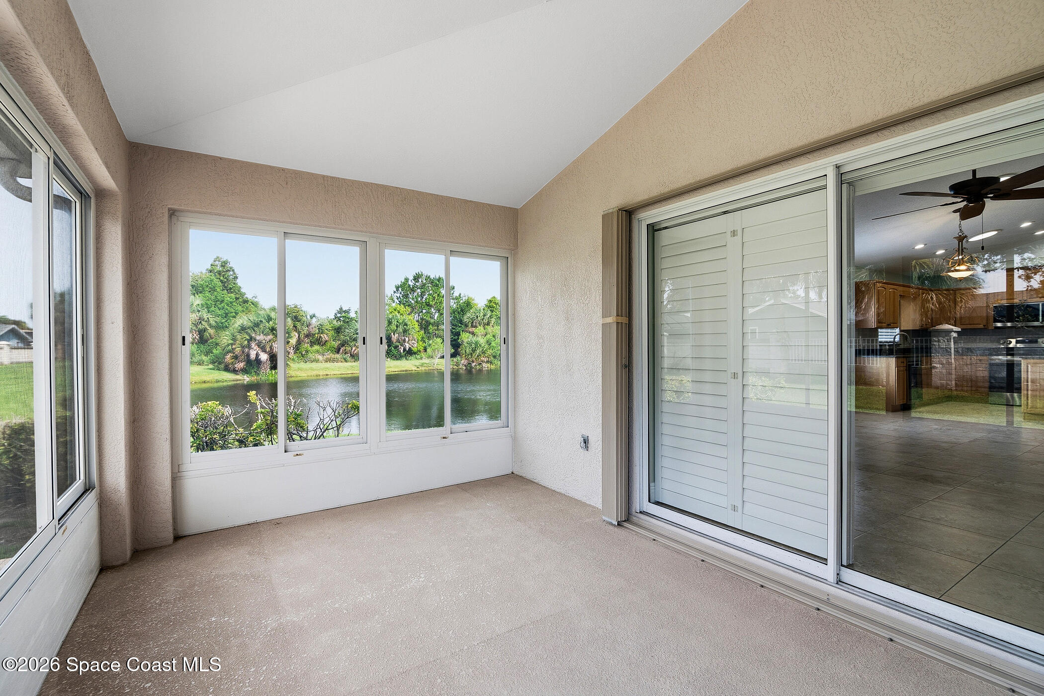 1785 Boca Rio Drive Melbourne, FL 32940 - Photo 36 of 66 Under-Truss Enclosed Screen Porch