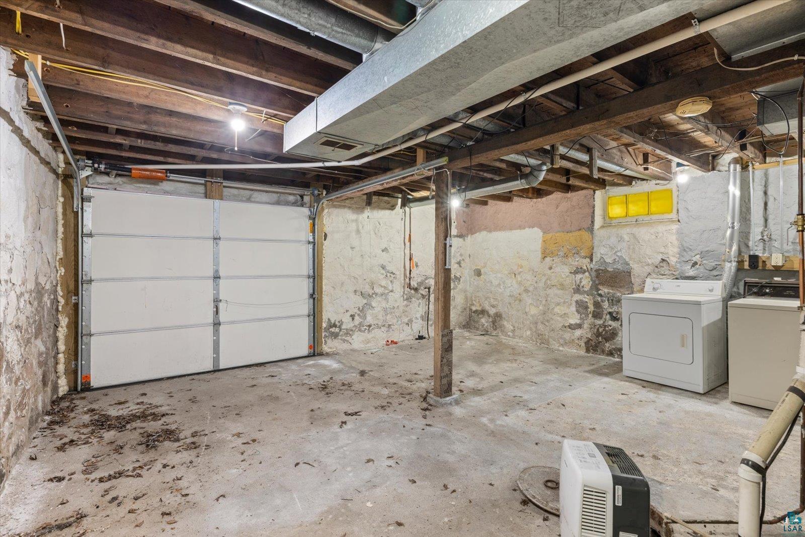 616 Summit Street Eveleth, MN 55734 - Photo 34 of 42 Garage with separate washer and dryer