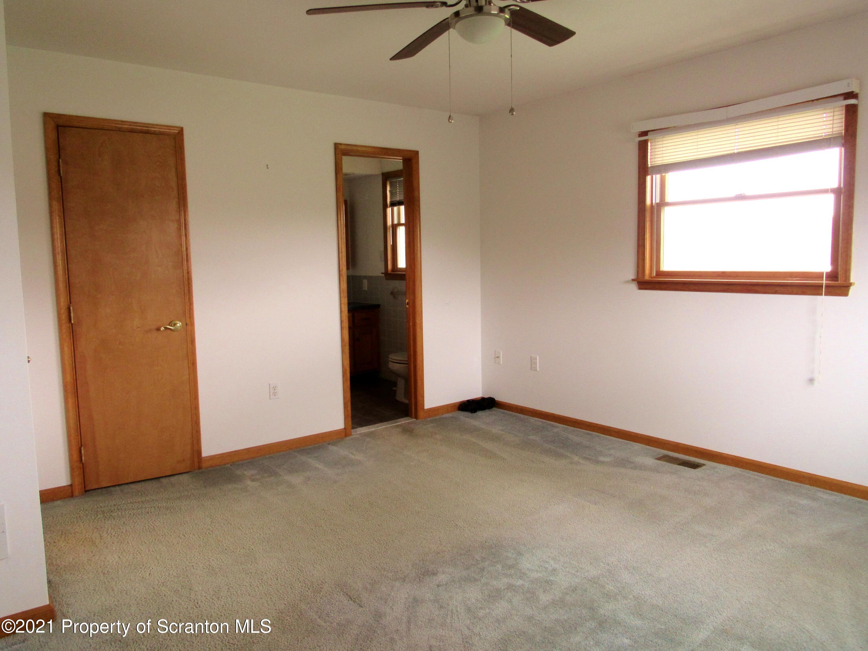 336 Aukema Road Meshoppen, PA 18630 - Photo 36 of 67 an empty room with a window