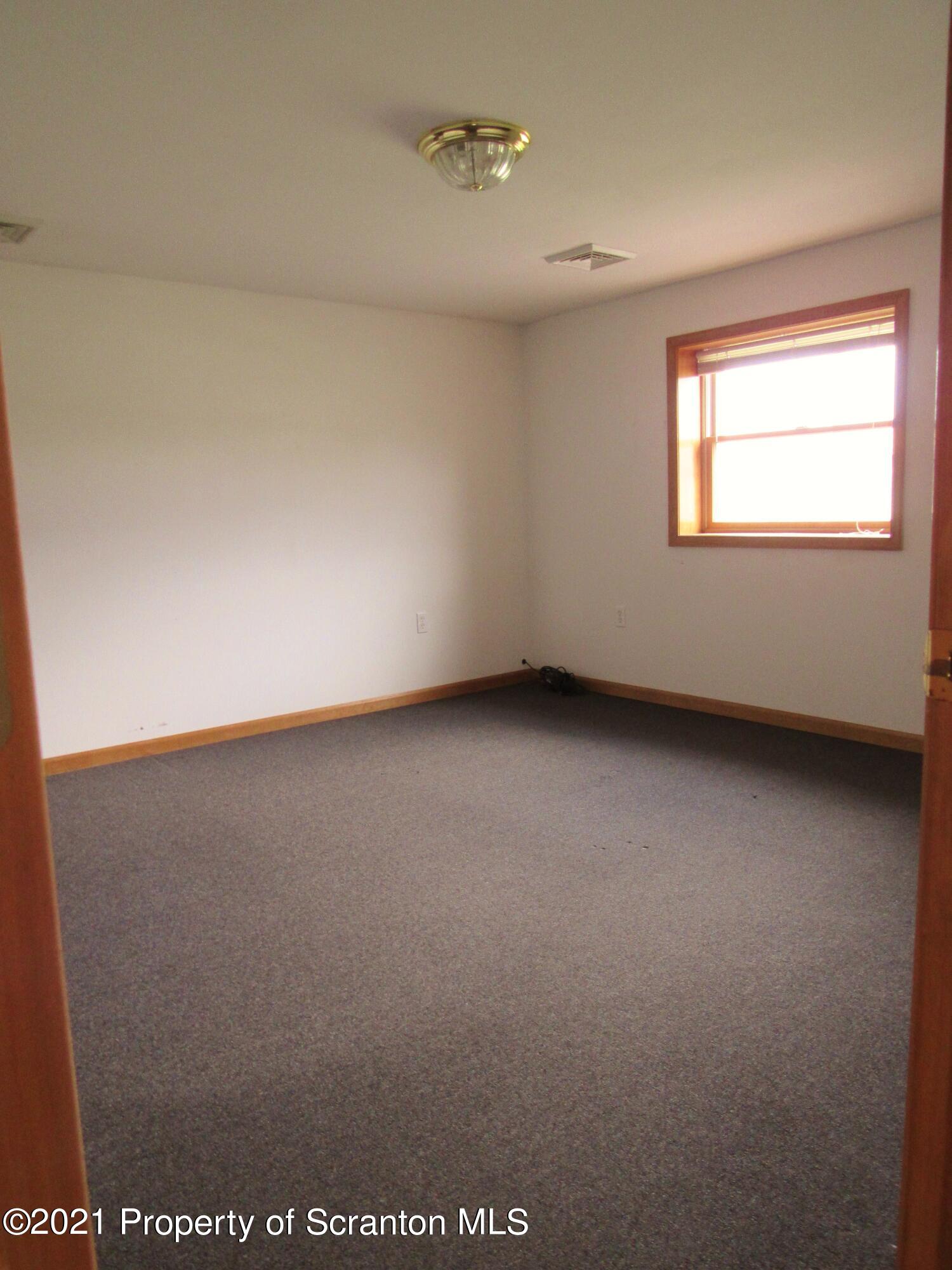 336 Aukema Road Meshoppen, PA 18630 - Photo 51 of 67 an empty room with a window