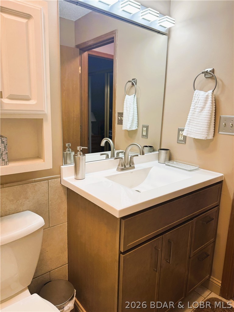 1442 Nichols Road, Unit D301 Osage Beach, MO 65065 - Photo 12 of 42 NEW Shower Door, Vanity & Lighting