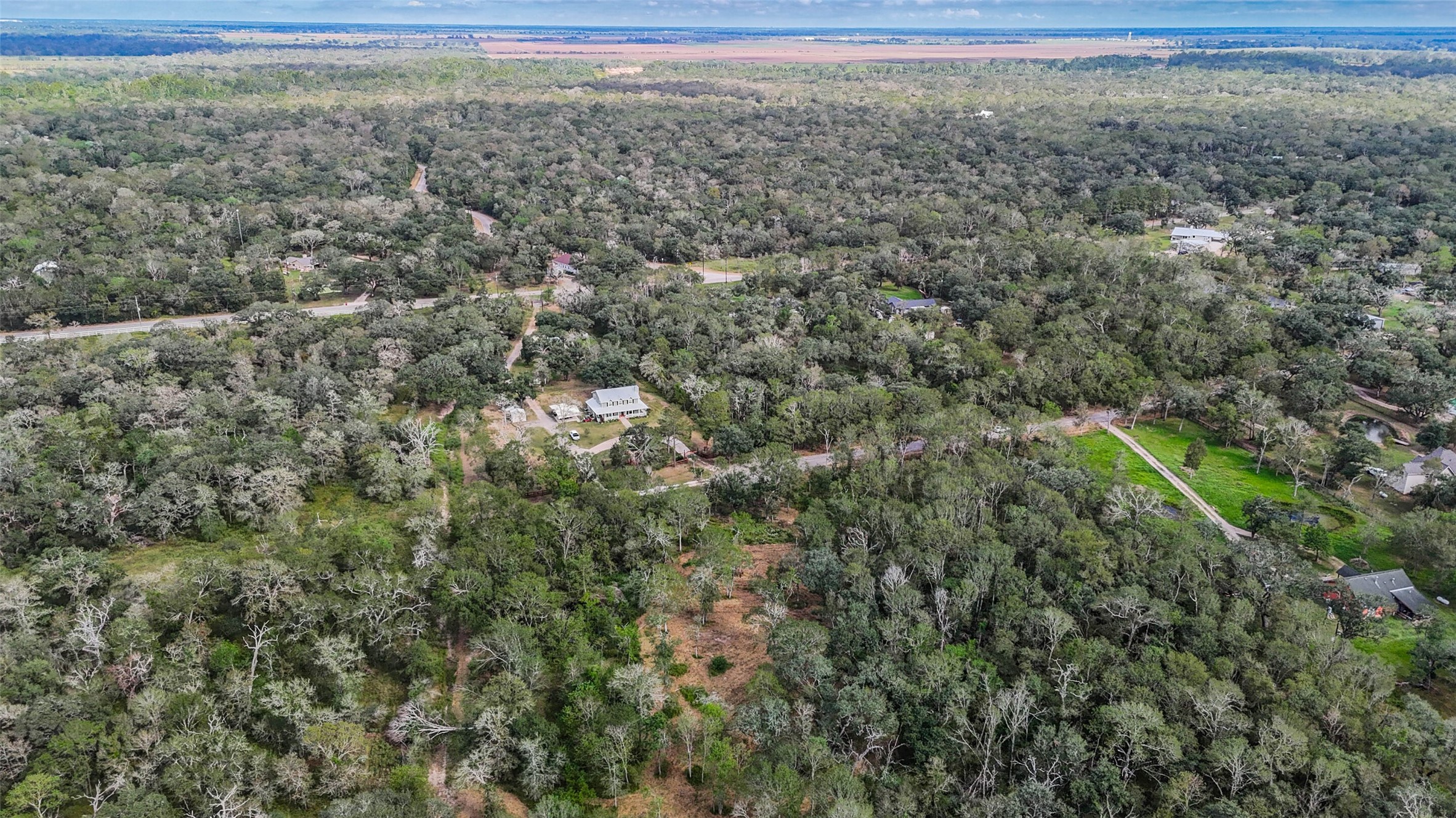 0 Live Oak Street Damon, TX 77430 - Photo 2 of 28 a view of a big yard of the house