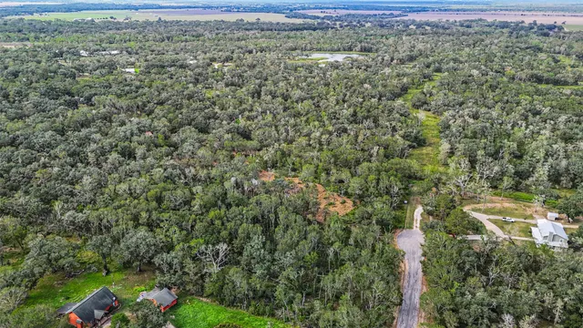 an outdoor view of house with green space